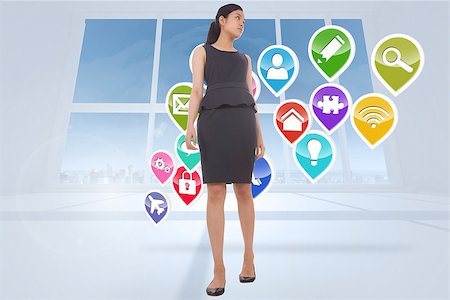 simsearch:400-07277726,k - Asian businesswoman walking against bright green room with windows Stock Photo - Budget Royalty-Free & Subscription, Code: 400-07277982