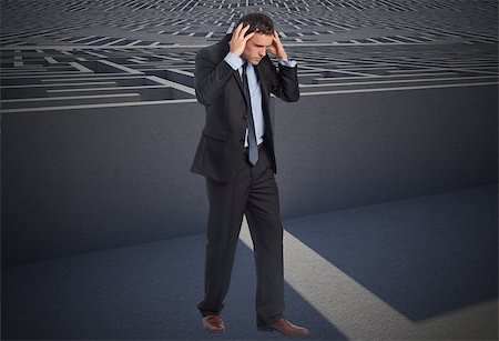 simsearch:400-07446676,k - Stressed businessman with hands on head against entrance to difficult maze puzzle Foto de stock - Super Valor sin royalties y Suscripción, Código: 400-07278116