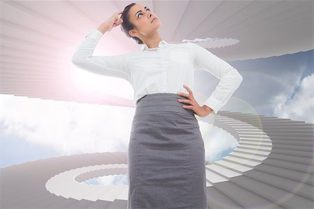 person on winding stairs - Focused businesswoman against winding staircase in the sky Stock Photo - Budget Royalty-Free & Subscription, Code: 400-07278245