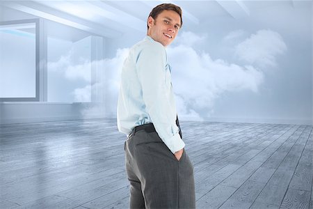 simsearch:400-07446676,k - Happy businessman standing with hands in pockets against room with holographic cloud Foto de stock - Super Valor sin royalties y Suscripción, Código: 400-07278249