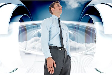 simsearch:400-07446676,k - Serious businessman standing with hand in pocket against cloud design on a futuristic structure Foto de stock - Super Valor sin royalties y Suscripción, Código: 400-07278379