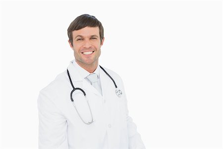 simsearch:400-04217553,k - Portrait of a smiling confident male doctor over white background Foto de stock - Royalty-Free Super Valor e Assinatura, Número: 400-07270921