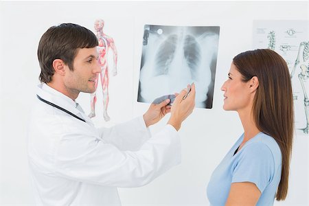 simsearch:400-07269250,k - Male doctor explaining lungs x-ray to female patient in the medical office Stock Photo - Budget Royalty-Free & Subscription, Code: 400-07270937