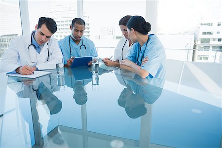 doctor office group - Group of young doctors in a meeting at hospital Stock Photo - Budget Royalty-Free & Subscription, Code: 400-07273081