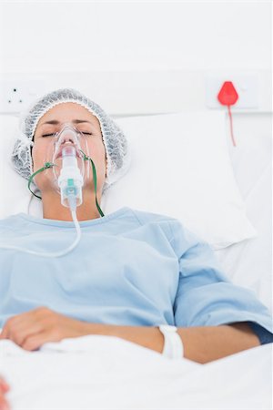 Young female patient receiving artificial ventilation in the hospital Stock Photo - Budget Royalty-Free & Subscription, Code: 400-07273105
