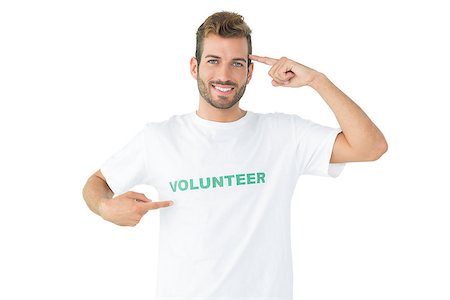 simsearch:400-07273307,k - Portrait of a happy male volunteer pointing to himself over white background Stockbilder - Microstock & Abonnement, Bildnummer: 400-07273247