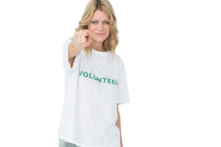 simsearch:400-07273307,k - Portrait of a happy female volunteer pointing at you over white background Stockbilder - Microstock & Abonnement, Bildnummer: 400-07273269
