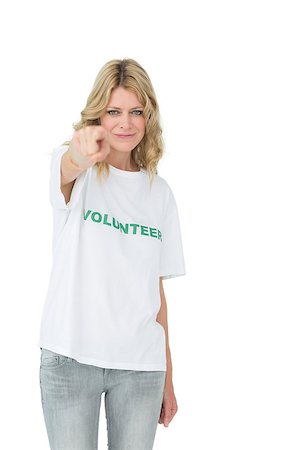 simsearch:400-07273307,k - Portrait of a happy female volunteer pointing at you over white background Stockbilder - Microstock & Abonnement, Bildnummer: 400-07273270