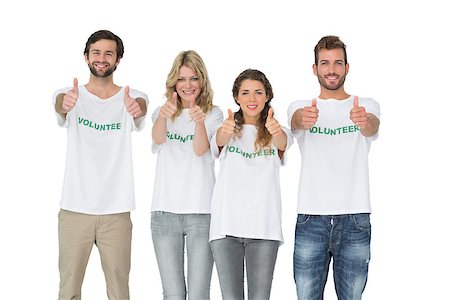 Group portrait of happy volunteers gesturing thumbs up over white background Foto de stock - Super Valor sin royalties y Suscripción, Código: 400-07273292