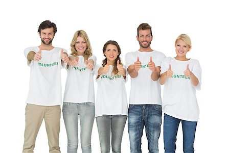 Group portrait of happy volunteers gesturing thumbs up over white background Stockbilder - Microstock & Abonnement, Bildnummer: 400-07273305