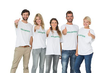 Group portrait of happy volunteers gesturing thumbs up over white background Stockbilder - Microstock & Abonnement, Bildnummer: 400-07273307