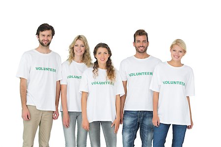 simsearch:400-07273325,k - Group portrait of happy volunteers standing over white background Foto de stock - Royalty-Free Super Valor e Assinatura, Número: 400-07273303