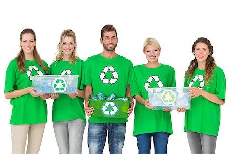 simsearch:400-07273325,k - Group portrait of young people in recycling symbol tshirts carrying boxes over white background Foto de stock - Royalty-Free Super Valor e Assinatura, Número: 400-07273336