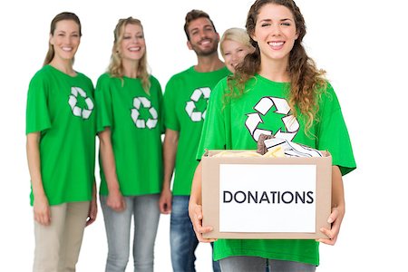 donation - Group portrait of young people in recycling symbol tshirts with donation box over white background Stock Photo - Budget Royalty-Free & Subscription, Code: 400-07273339