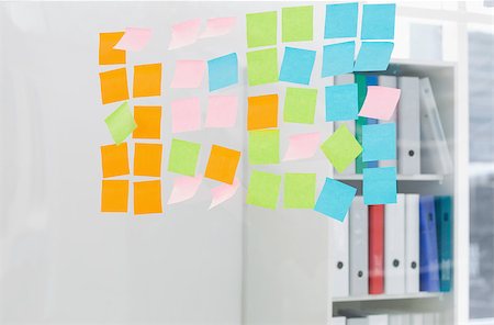 Closeup of colorful sticky notes on glass wall at the office Stock Photo - Budget Royalty-Free & Subscription, Code: 400-07273436