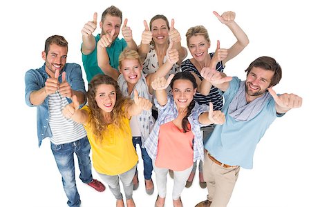 simsearch:400-07273307,k - Group portrait of casual cheerful people gesturing thumbs up over white background Stockbilder - Microstock & Abonnement, Bildnummer: 400-07273503