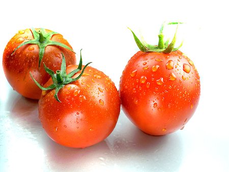 simsearch:400-07288793,k - Fresh Red tomatoes isolated on white background Photographie de stock - Aubaine LD & Abonnement, Code: 400-07288492