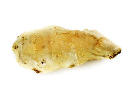 simsearch:400-06358844,k - Fresh Ginger root on a white background Photographie de stock - Aubaine LD & Abonnement, Code: 400-07288667