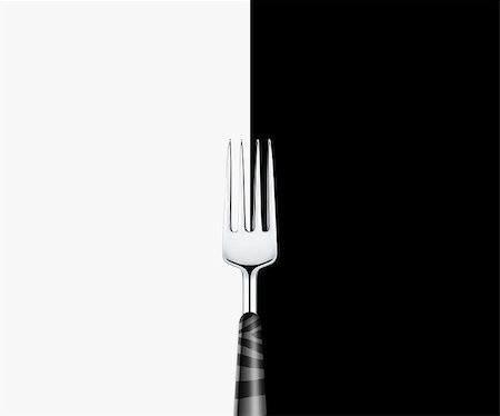 simsearch:824-07310346,k - Sharp metal fork on white and black background Foto de stock - Super Valor sin royalties y Suscripción, Código: 400-07288943