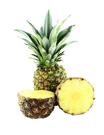 simsearch:400-07289954,k - ripe pineapple with slices isolated on white background Foto de stock - Royalty-Free Super Valor e Assinatura, Número: 400-07289302