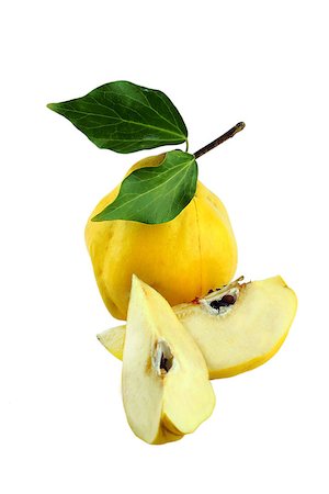 simsearch:400-06457388,k - sweet quinces with leaves and slice on white Photographie de stock - Aubaine LD & Abonnement, Code: 400-07289311