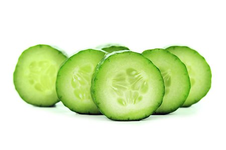 designsstock (artist) - Fresh Cucumber and slices white background. Fotografie stock - Microstock e Abbonamento, Codice: 400-07289490