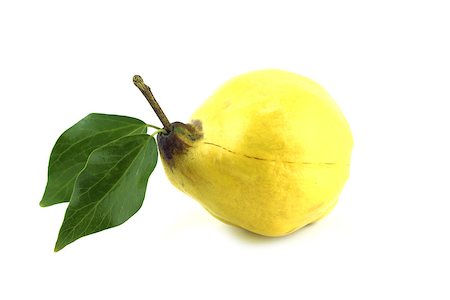 simsearch:400-06457388,k - sweet quinces with leaves and slice on white Photographie de stock - Aubaine LD & Abonnement, Code: 400-07289614