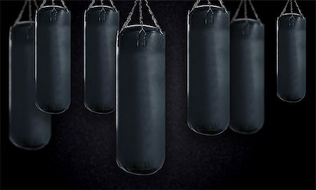 simsearch:400-07036748,k - black Punching bag for boxing or kick boxing sport. Foto de stock - Royalty-Free Super Valor e Assinatura, Número: 400-07289742