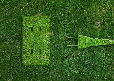 Green energy concept, Green power plug in electric outlet on a green grassland. Stock Photo - Budget Royalty-Free & Subscription, Code: 400-07289769