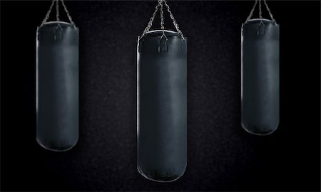 simsearch:400-07036748,k - black Punching bag for boxing or kick boxing sport. Foto de stock - Royalty-Free Super Valor e Assinatura, Número: 400-07289824