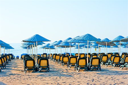 simsearch:400-06947087,k - neat rows of sun loungers on the beach Stock Photo - Budget Royalty-Free & Subscription, Code: 400-07294084