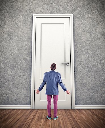 simsearch:400-06567183,k - Man before a big door in fear of the unknown Stock Photo - Budget Royalty-Free & Subscription, Code: 400-07294217