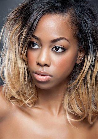 simsearch:400-07292674,k - Attractive black woman with perfect skin Photographie de stock - Aubaine LD & Abonnement, Code: 400-07294475