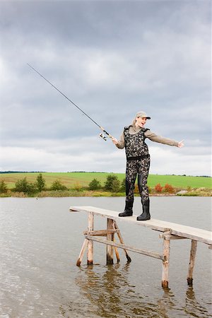 simsearch:400-07501738,k - woman fishing on pier at pond Photographie de stock - Aubaine LD & Abonnement, Code: 400-07294673