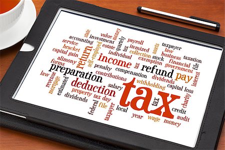 rimborso - cloud  of words related to taxes, preparation, paying, income, refunds, on a digital tablet with a cup of tea Fotografie stock - Microstock e Abbonamento, Codice: 400-07295044