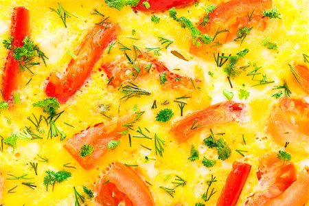 Omelet with paprika, tomato and herbs on a plate Stock Photo - Budget Royalty-Free & Subscription, Code: 400-07295460