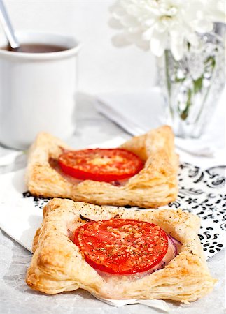 Breakfast with tomato tarts and cup of coffee Stock Photo - Budget Royalty-Free & Subscription, Code: 400-07295672