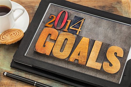 simsearch:400-07179122,k - 2014 goals - New Year resolution concept - text in vintage letterpress wood type on a digital tablet screen Stock Photo - Budget Royalty-Free & Subscription, Code: 400-07295770