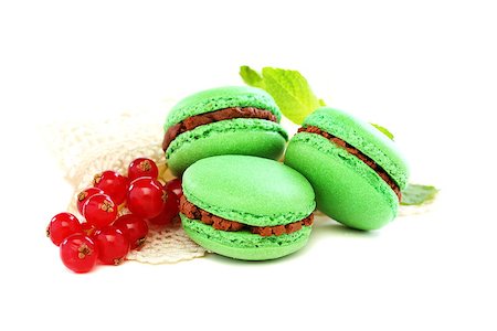 Macarons stuffed with chocolate and mint on a white background. Photographie de stock - Aubaine LD & Abonnement, Code: 400-07296795