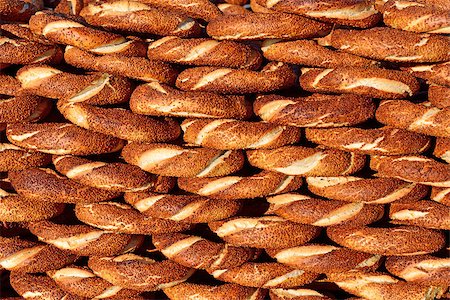 people eating bagels - nice baked bagel sold on the street, Traditional Turkish Fastfood Photographie de stock - Aubaine LD & Abonnement, Code: 400-07297186