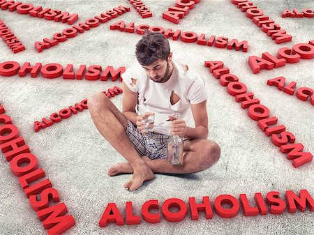 drucken - The young man with a alcohol bottle in a hand Stock Photo - Budget Royalty-Free & Subscription, Code: 400-07297306