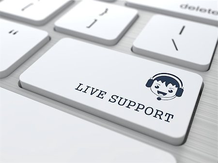 Live Support Concept. Boy with Headset Icon on White Keyboard Button. Stock Photo - Budget Royalty-Free & Subscription, Code: 400-07297612