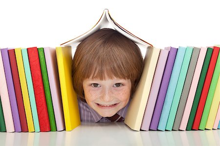 simsearch:400-08404925,k - Happy boy with colorful books and a big grin - isolated Stock Photo - Budget Royalty-Free & Subscription, Code: 400-07297821