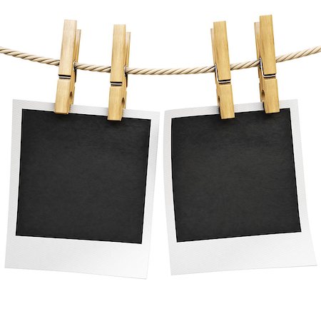 simsearch:400-06463913,k - Photo frames on the rope. isolated on white. Foto de stock - Super Valor sin royalties y Suscripción, Código: 400-07297986