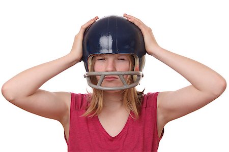 simsearch:400-07624970,k - Portrait on an angry teenage girl wearing a football helmet on white background Foto de stock - Super Valor sin royalties y Suscripción, Código: 400-07298028