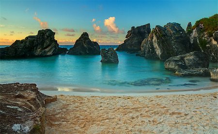 A calm, tropical cove at sunrise Stockbilder - Microstock & Abonnement, Bildnummer: 400-07298196