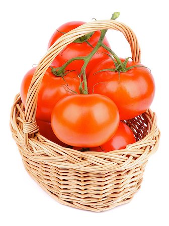 simsearch:400-08011809,k - Fresh Ripe Tomatoes with Stems and Twigs in Wicker Basket isolated on white background Photographie de stock - Aubaine LD & Abonnement, Code: 400-07298259