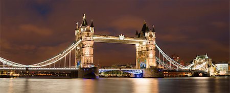 drawbridge - London Tower bridge on sunset illuminated with different colors Foto de stock - Super Valor sin royalties y Suscripción, Código: 400-07298277