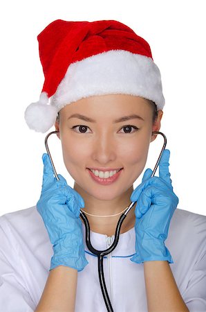 Christmas doctor with stethoscope and gloves isolated on white Stock Photo - Budget Royalty-Free & Subscription, Code: 400-07298353