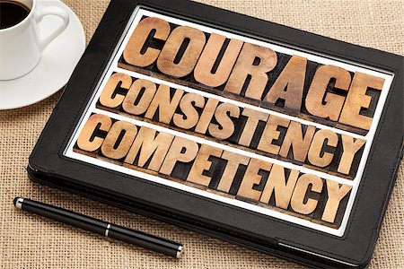 simsearch:400-07179122,k - courage, consistency, competency in vintage letterpress wood type on a digital tablet with a cup of coffee Stock Photo - Budget Royalty-Free & Subscription, Code: 400-07298399